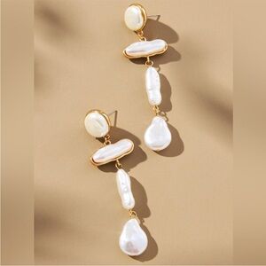 Anthro Shaped Pearl Drop Earrings